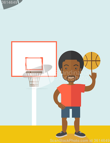 Image of Basketball player spinning ball.