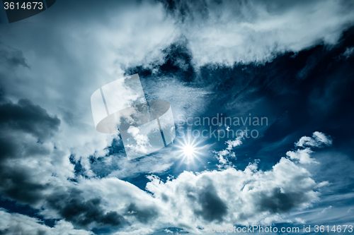 Image of sky with clouds and sun