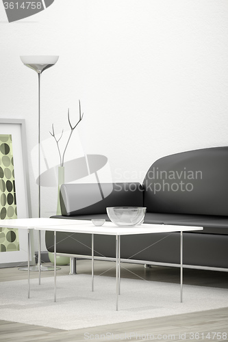 Image of black sofa in a white room