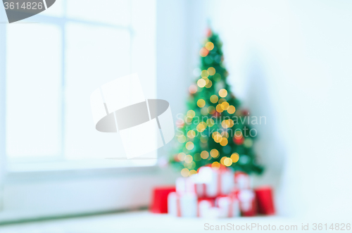 Image of room with christmas tree and presents background