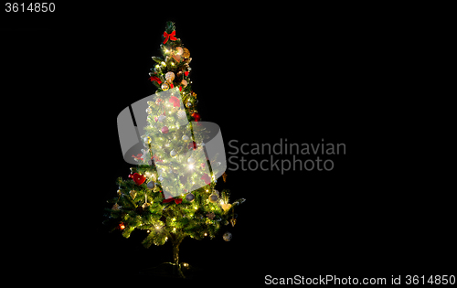 Image of beautiful decorated and illuminated christmas tree