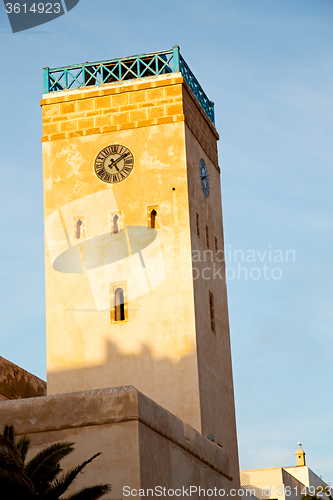 Image of old brick tower in   sky