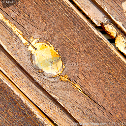 Image of home texture of a brown antique wooden old door in italy   europ