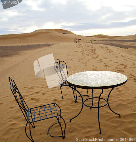 Image of table and seat in desert  sahara morocco    africa yellow sand