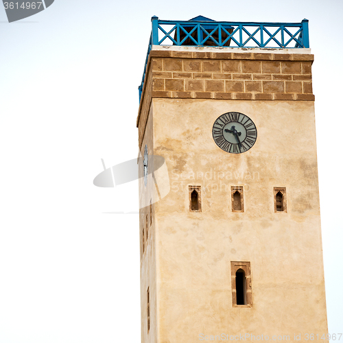 Image of old brick tower in morocco africa village and the sky