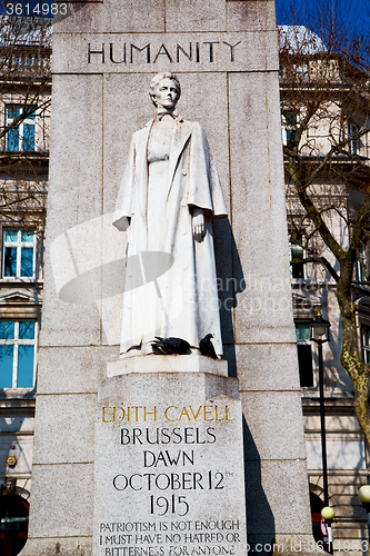 Image of england  and statue in old city of  