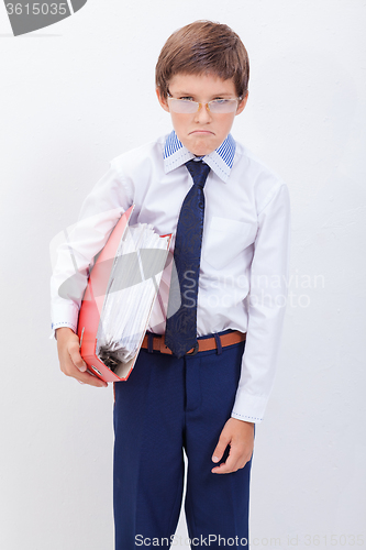 Image of The boy with folders 