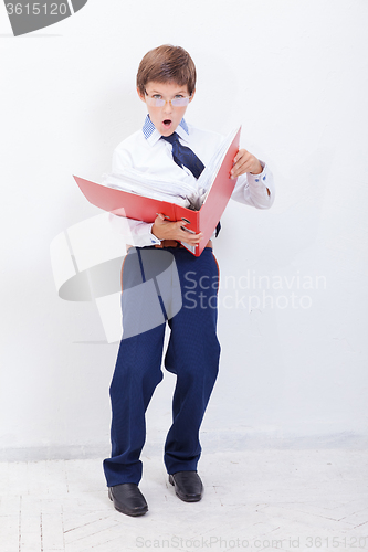 Image of The boy with folders 