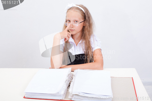 Image of Schoolgirl with folders 