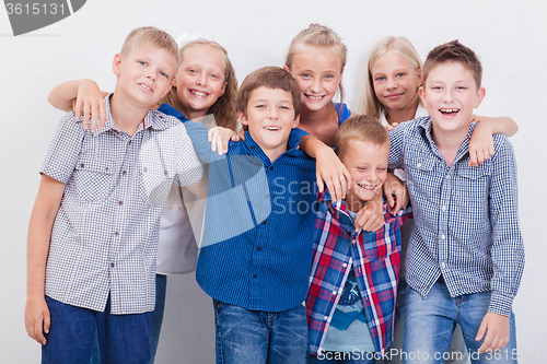 Image of The smiling teenagers on white 