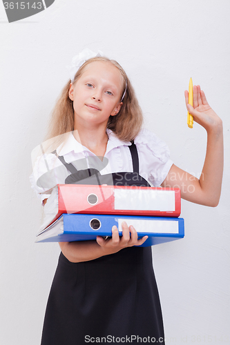 Image of Schoolgirl with folders 