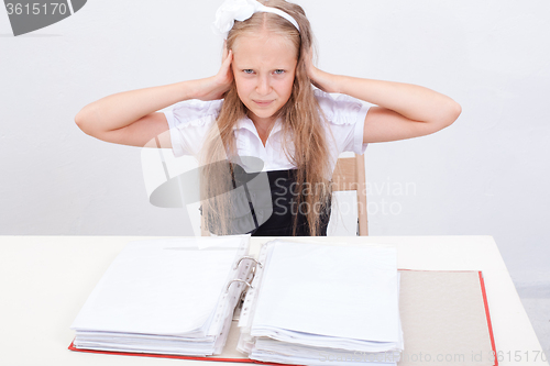 Image of Schoolgirl with folders 