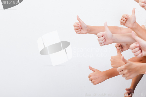 Image of hands of teenagers showing okay sign on white 