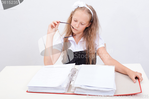 Image of Schoolgirl with folders 