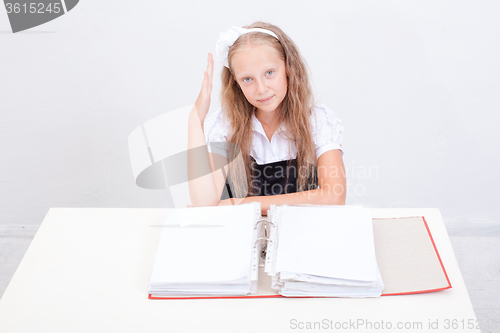 Image of Schoolgirl with folders 