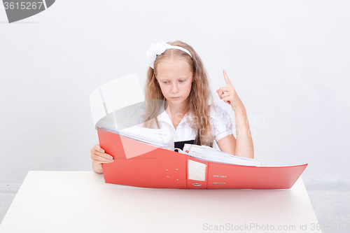 Image of Schoolgirl with folders 