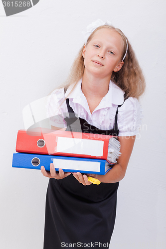 Image of Schoolgirl with folders 