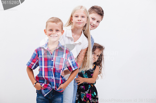 Image of The smiling teenagers on white 