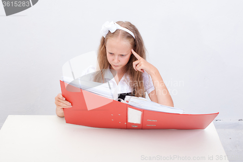 Image of Schoolgirl with folders 