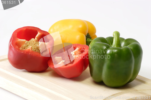 Image of Peppers on Kitchen Board