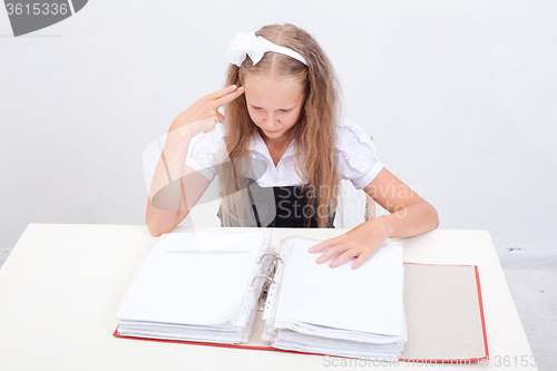 Image of Schoolgirl with folders 