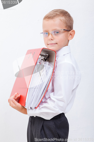 Image of The boy with folders 