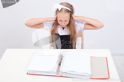 Image of Schoolgirl with folders 