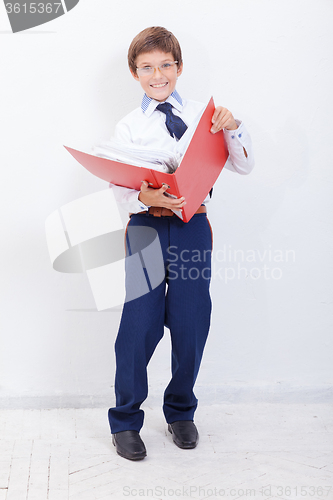 Image of The boy with folders 