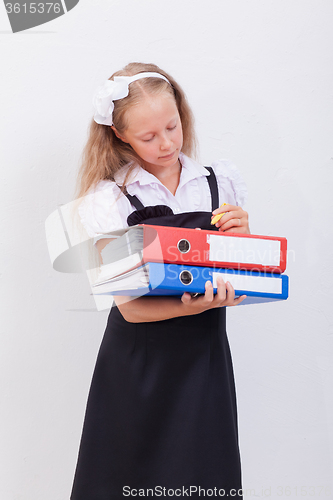 Image of Schoolgirl with folders 