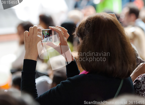 Image of Woman with phone