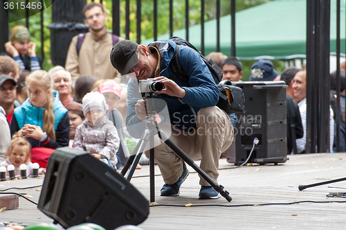 Image of Photographer with tripod