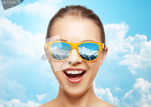 Image of happy face of teenage girl in sunglasses