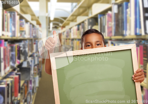 Image of Hispanic Boy with Empty Chalk Board in Library