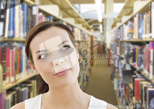 Image of Mixed Race Girl Looking to the Side in the Library