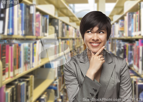 Image of Mixed Race Girl Looking to the Side in the Library