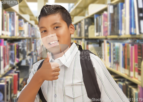 Image of Hispanic Student Boy with Thumbs Up in the Library