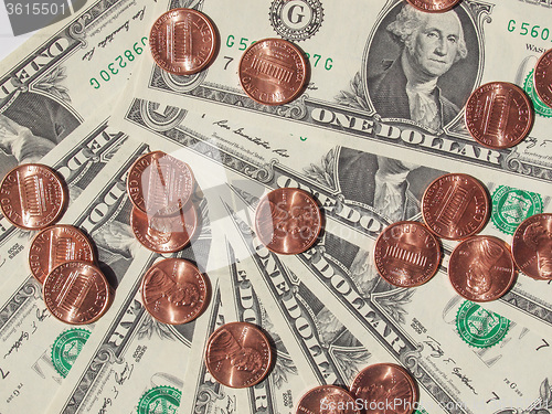 Image of Dollar coins and notes