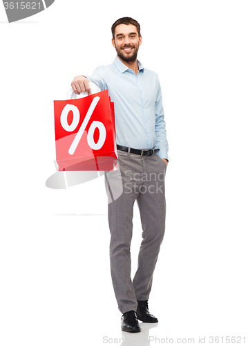 Image of smiling man with red shopping bag