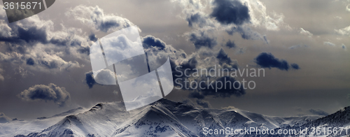 Image of Panoramic view on evening mountains and cloudy sky