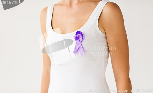 Image of close up of woman with purple awareness ribbon