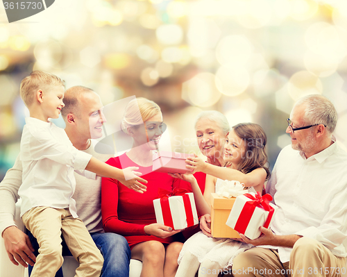 Image of smiling family with gifts