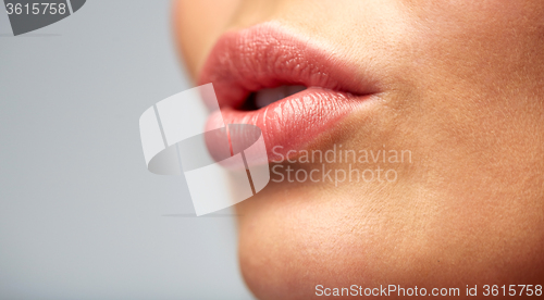 Image of close up of young woman lips