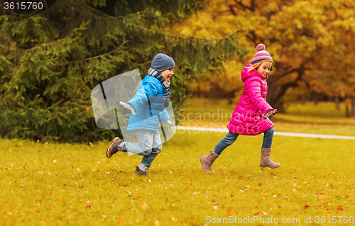 Image of group of happy little kids running outdoors