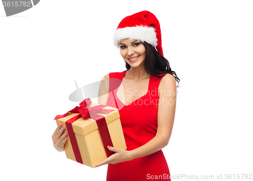 Image of beautiful sexy woman in santa hat with gift box