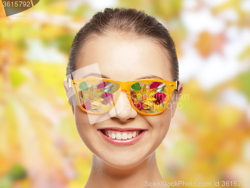 Image of happy face of teenage girl in sunglasses