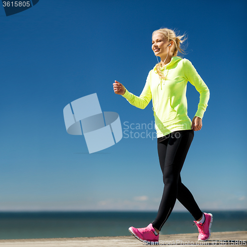 Image of woman doing sports outdoors