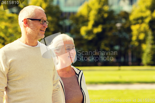 Image of senior couple in city park