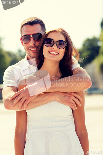 Image of smiling couple in city