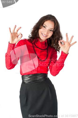 Image of Happy smiling business woman with ok hand sign