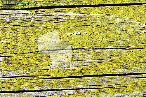 Image of Surface of an empty green wooden background.